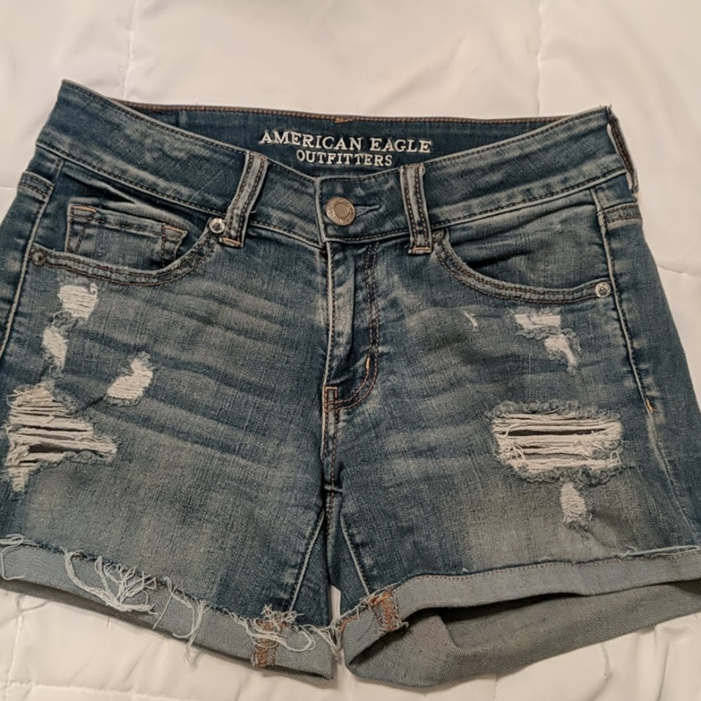 Mid rise cutoff cuff denim shorts
